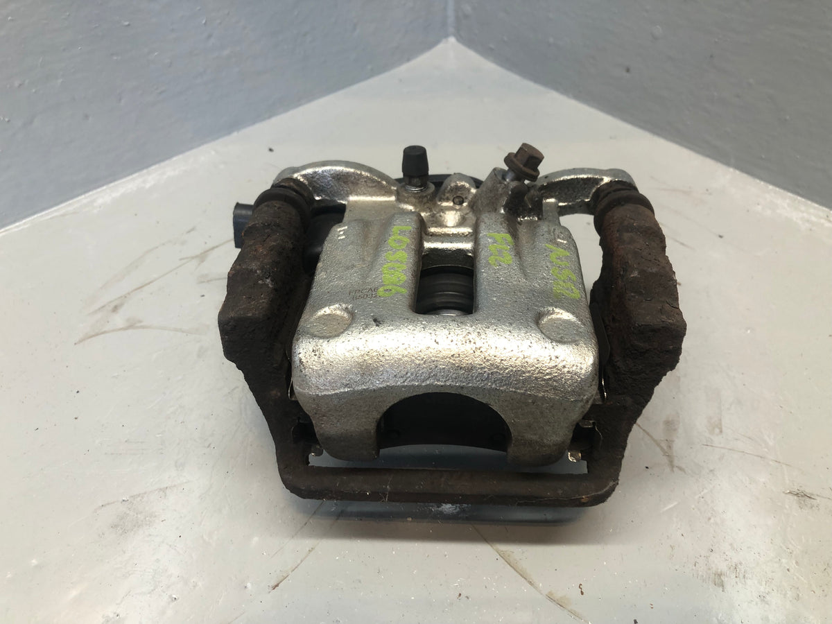 Freelander 2 Brake Caliper with Parking Actuator Near Side Rear Land Rover