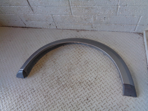 Discovery 4 Wheel Arch Trim Front Left Stornoway Grey Land Rover 2009 to 2016