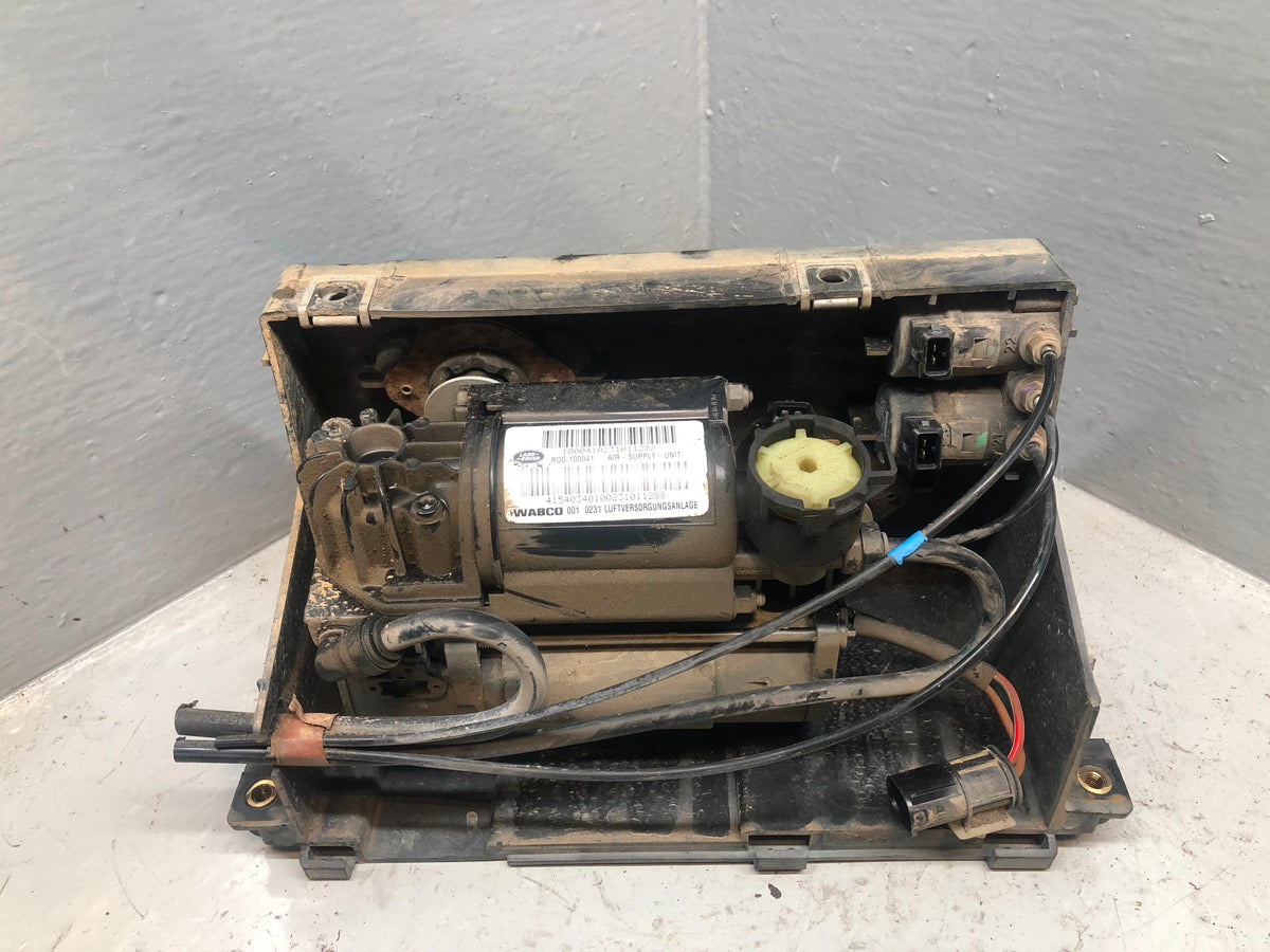 Discovery 2 Air Suspension Compressor Wabco RQG100041 Housing Land Rover R18125